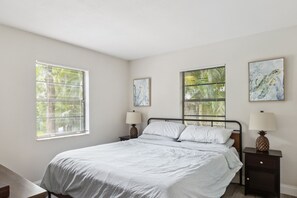 2nd bedroom overlooks the backyard and pool