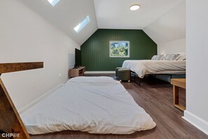 Additional Queen size stow-away floor mattress to sleep extra guests