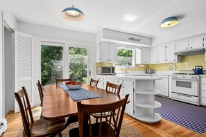 Open floorplan connecting the main living areas of this home - 94 Joshua Jethro Road Chatham Cape Cod - Cape Escape - NEVR