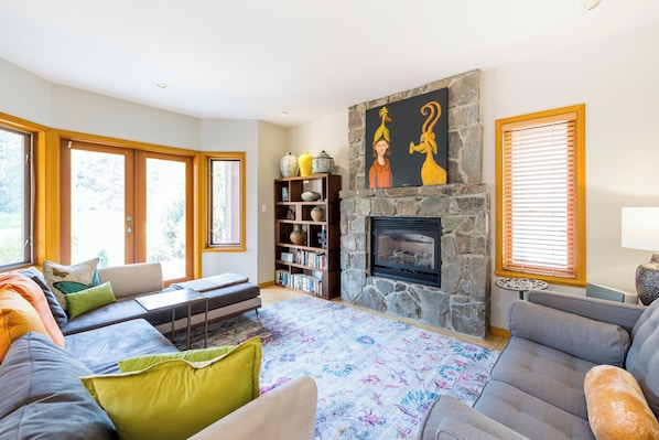 Living Area with Gas Fireplace & Views of the Golf Course