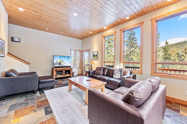 Living room: Smart TV with cable and DVD player, radiant floor heating, no A/C
