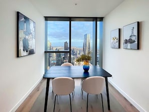 Dining area with skyline view aside
