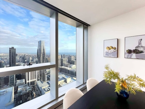 Dining area with skyline view aside