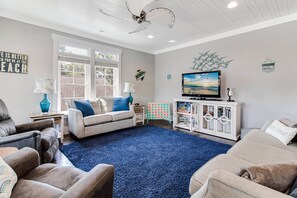There is Plenty of Comfortable Seating for Conversation & Entertainment. Smart TV for Streaming your Favorite Shows/Movies.