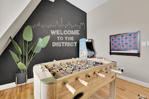 Let the games begin! Foosball table, Pacman machine, Connect 4 and a chalkboard wall are waiting to entertain you!