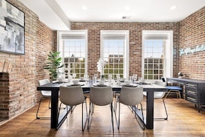 Expansive windows + exposed brick = architectural paradise