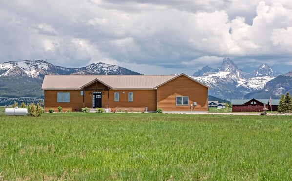 Take in beautiful, unobstructed views of the Tetons from the comfort of this well-appointed family home.