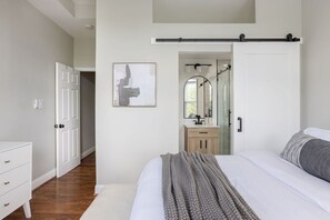 The ultimate retreat after a long day of exploring all that the city has to offer, this getaway is complete with Queen-sized memory foam mattress, plush pillows and modern details throughout the space
