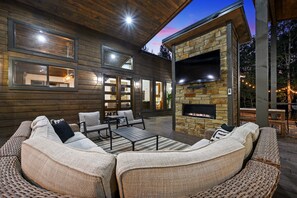 Oversized sectional surrounding the fireplace & TV!