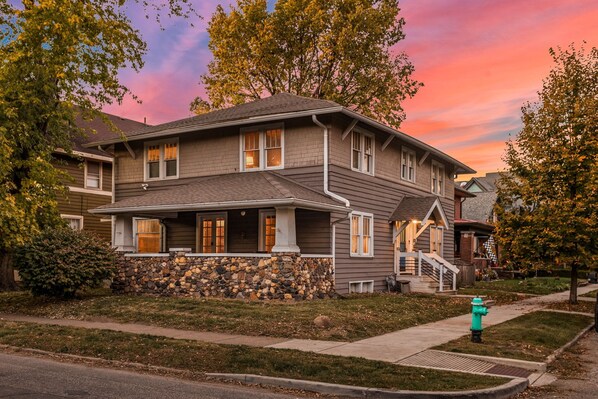 Exterior View: Experience charming architecture against stunning sunset hues in Indianapolis!