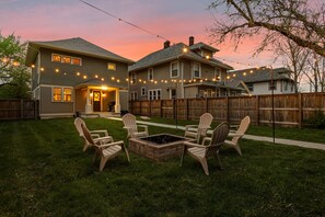 Backyard Retreat: Gather around the fire pit under twinkling lights for unforgettable evenings!