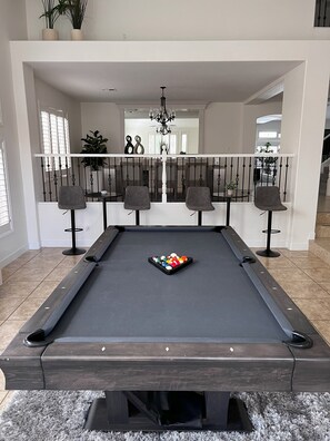 Front room with pool table 