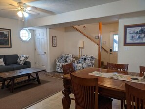 downstairs living room and part of the dining table which seats 8