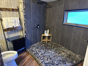Master bathroom shower with rain head.