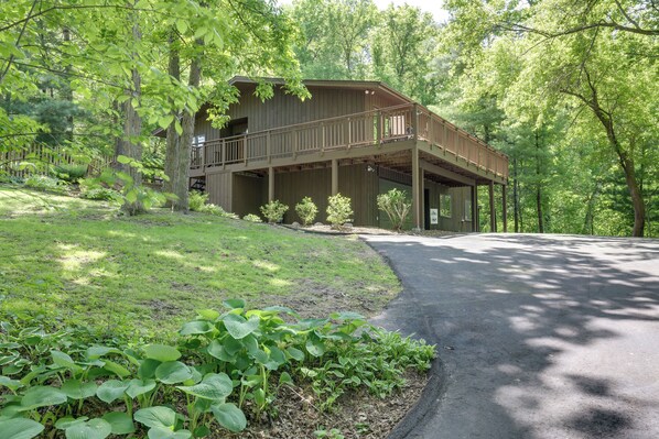 Secluded retreat in the bluffs with tree-lined views.