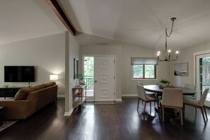 Open floor plan between kitchen, dining and living areas.