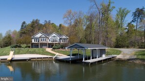 Pulled back pic showing the boat ramp for easing in any private or rented boats