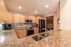 Kitchen with Mud Room from Garage on Right Side