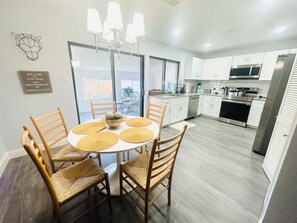 Open floor plan kitchen with bonus sunroom for your enjoyment!