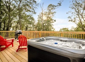 Relax on the large deck with hot tub and gas grill.