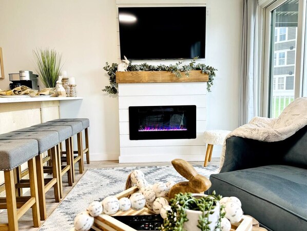 Electric fireplace and large flat screen smart TV