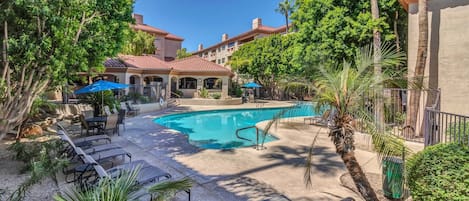 Community Pool and Spa with plenty of outdoor seating & lounging