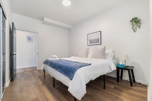 Bedroom 2 : King-Bed with memory foam mattress facing clothing storage