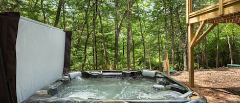 Private backyard provides brand new hot tub, seats 6