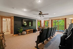 Watch movies in the theater with Polk audio sound system.
