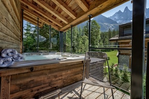 Hot tub on balcony off living area 