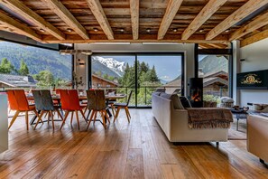 Bright living area with large glass doors onto balcony