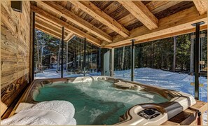 Hot tub on balcony off living area 