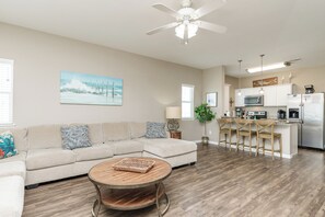 Spacious living, dining and kitchen area to spend time with family and friends