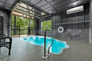Private pool with a garage door, perfect for year-round pool parties!