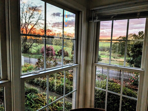 The sunroom is a perfect place for you to enjoy coffee and sunsets!