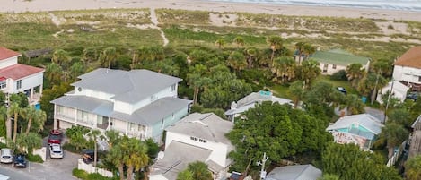 A drone view of Sweet Retreat - just steps from the beach!