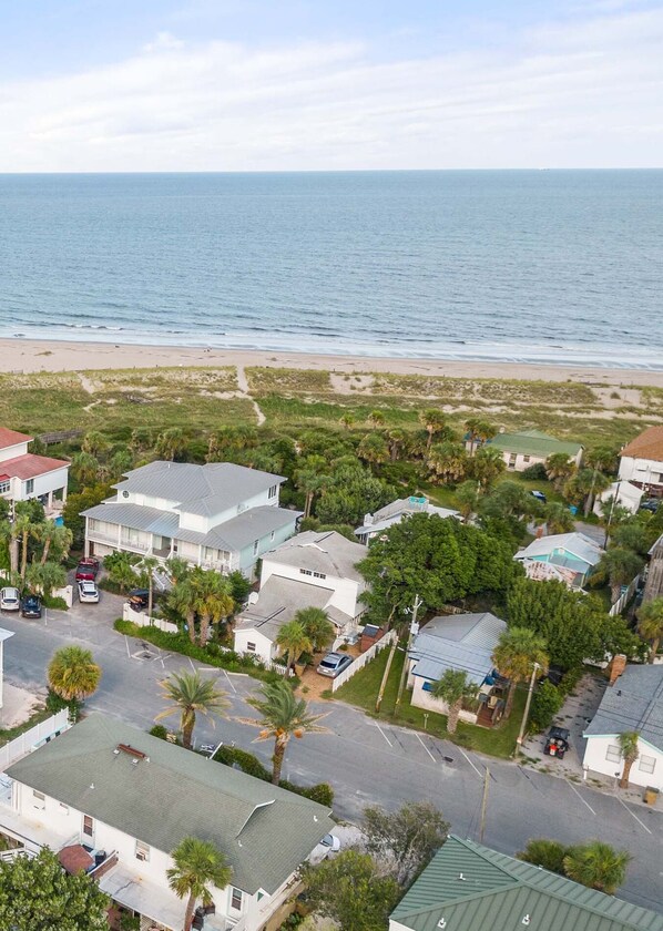 A drone view of Sweet Retreat - just steps from the beach!