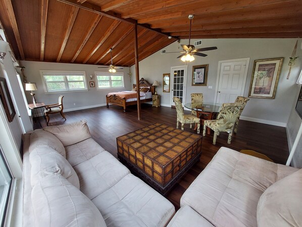 Loft space with corner sofa (hidden guest bed inside sofa)