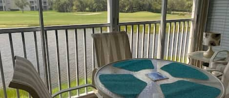 Rear Veranda View of of 3rd hole green and ponds
