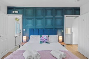 Room 2 is well-equipped for comfort and convenience! 

Double Bed with En-suite | Smart TV | Table and Chair | Wardrobe & Chest of Drawers