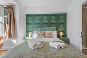 Room 1 is well-equipped for comfort and convenience!
Double Bed with En-suite | Smart TV | Table and Chair | Wardrobe & Chest of Drawers