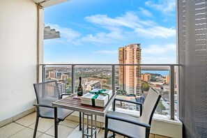 Dine alfresco or enjoy an evening wine on your private balcony while soaking up sprawling views.