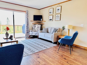 Living room with walkout deck and view of Lake Superior