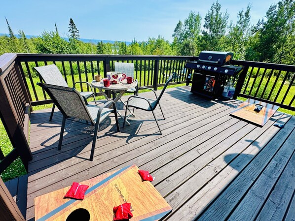Walkout Patio from Living Room W/ View of Lake Superior Overlooking the Trees
