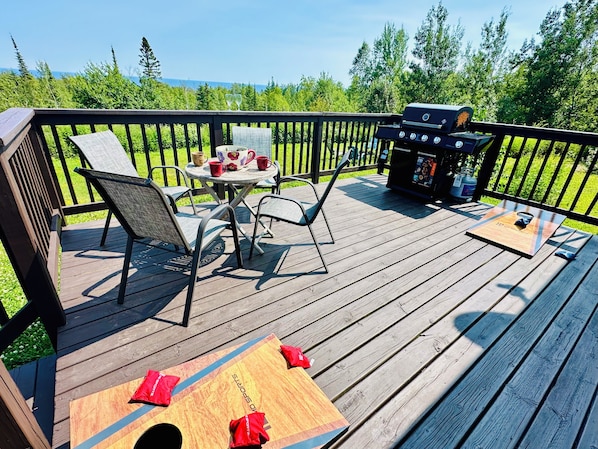 Walkout Patio from Living Room W/ View of Lake Superior Overlooking the Trees