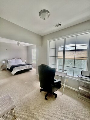 Spacious primary bathroom w/ office space 