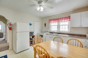 Kitchen & Dining Area | 1st-Floor Unit | Dishware & Flatware | Toaster