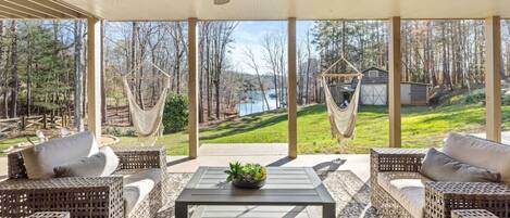 Relax outdoors with ample space and hanging swings!