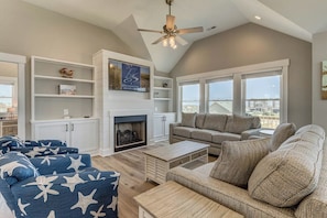 Top-Level Living Room with Deck Access