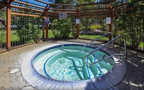 Year-round hot-tub is steps from the condo.